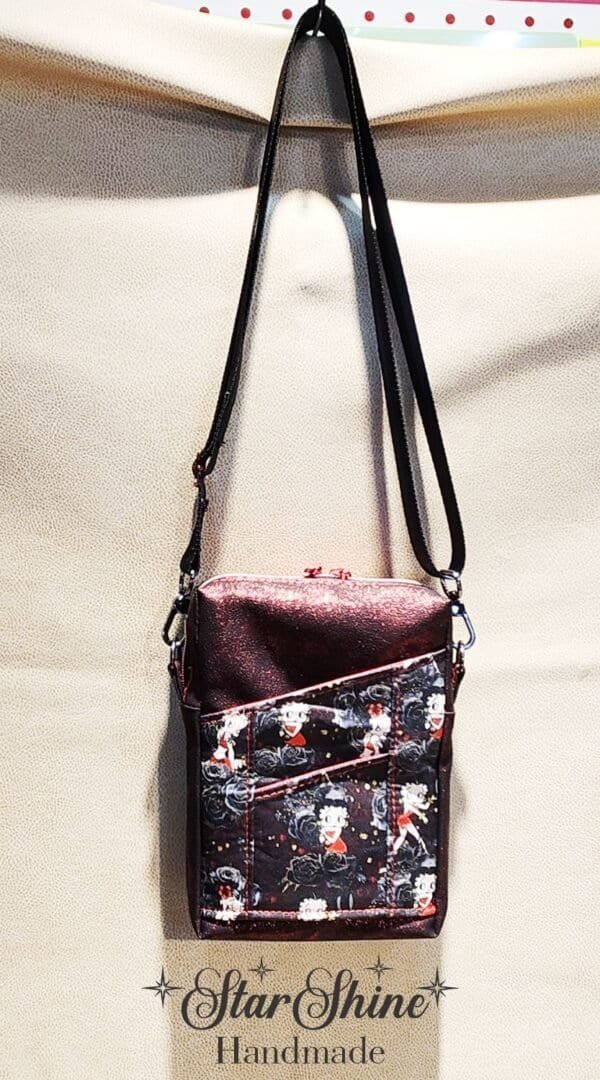 Betty Boop Pixie Crossbody in sparkling red faux leather.