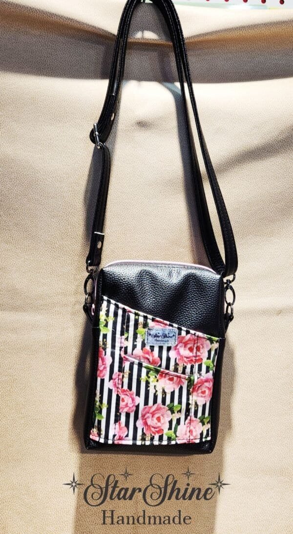 Black Striped Pixie crossbody in a gorgeous striped pink rose print.