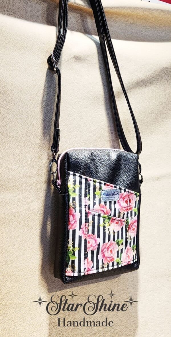 Black Striped Pixie crossbody in a gorgeous striped pink rose print.