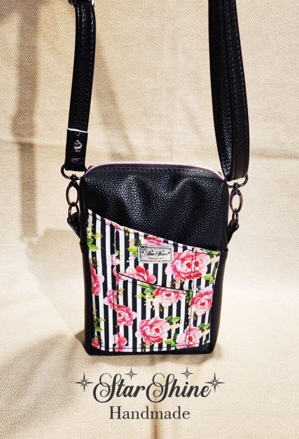 Black Striped Pixie crossbody in a gorgeous striped pink rose print.