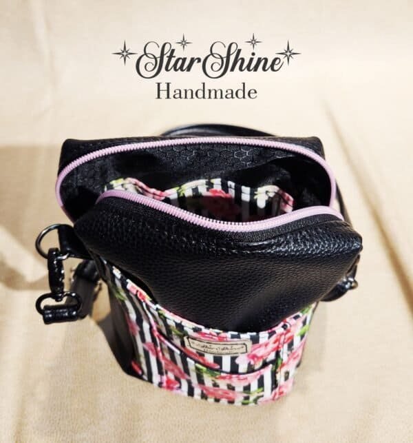 Black Striped Pixie crossbody in a gorgeous striped pink rose print. Interior view