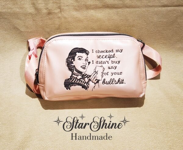 Pearl Pink Convertible Crossbody featuring a vintage inspired sarcastic quote “I Checked My Receipt, I didn't buy any of your bullshit”.